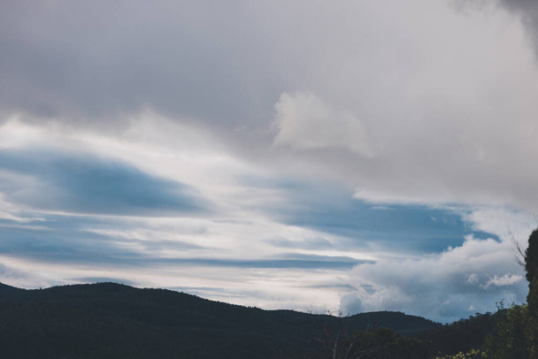 morning sky with beautiful clouds rolling over the hills of Tasmania, Australia - Φωτογραφία, εικόνα