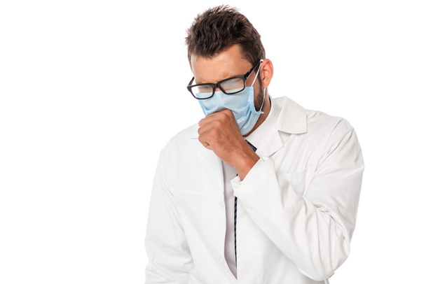 Sick doctor in medical mask coughing isolated on white - Фото, зображення