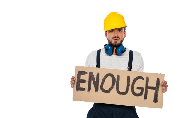 Angry builder holding signboard with enough lettering isolated on white - Photo, Image