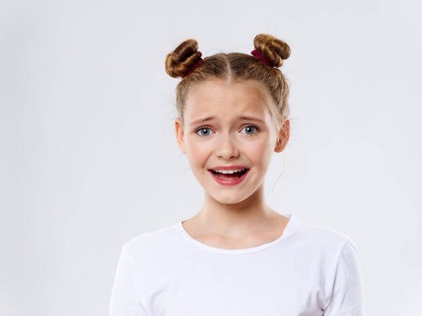 Cheerful pretty girl pigtails emotions confused look - Foto, Imagem