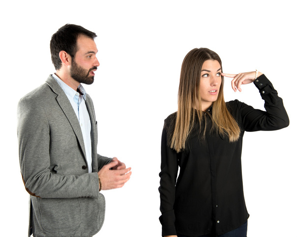 Empresária fazendo um gesto louco sobre fundo branco
 - Foto, Imagem