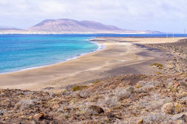 Risco beach surrounded by cliffs on Lanzarote - Spain - Photo, Image