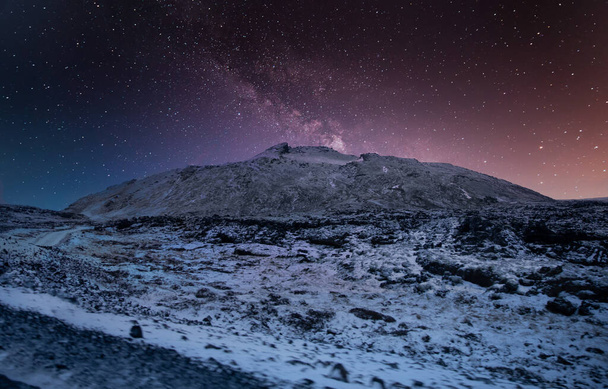 stars shine behind the mountain in winter - Photo, Image