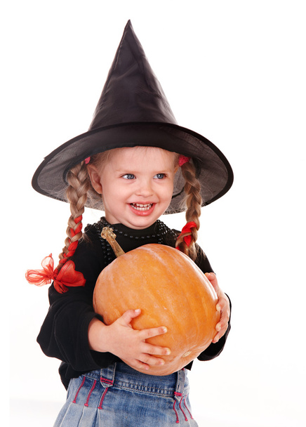 Child girl in costume Halloween witch with pumpkin, broom. - Photo, Image