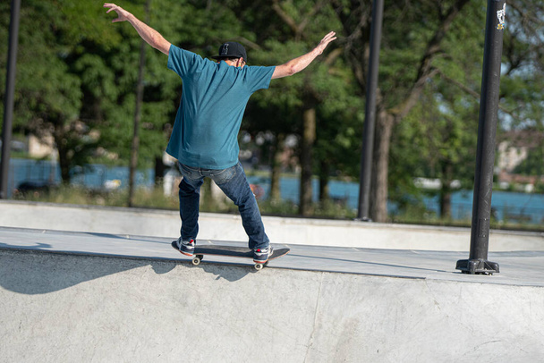 Detroit, Michigan, USA - 08.01.2019: Skaters practice their skateboard tricks in Detroit skate park - 写真・画像