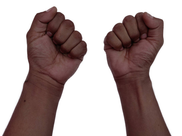 黒人の人権のためのアメリカでの黒人の生活の問題抗議を支援する白い背景の蜂起に黒い肌の手. - 写真・画像