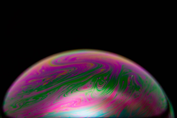 Highlights on Macro Soap Bubble with black background - Photo, Image