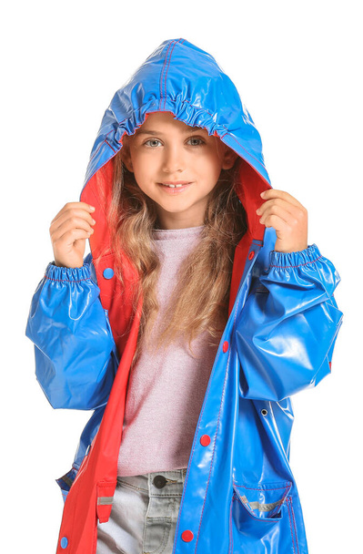 Cute little girl in raincoat on white background - Foto, immagini