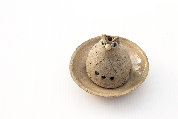 Manipulador de vela de búho de cerámica
 - Foto, imagen