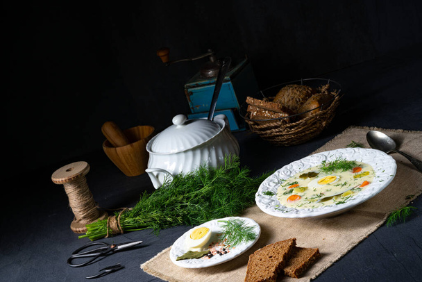 Dill soup with potato, fresh dill and egg - Фото, изображение