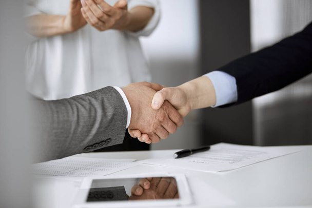 Business people shaking hands finishing contract signing, close-up. Business communication concept. Handshake and marketing - Foto, Imagem