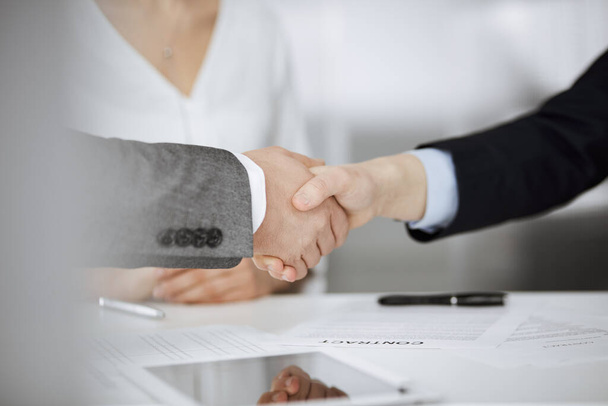 Business people shaking hands finishing contract signing, close-up. Business communication concept. Handshake and marketing - Fotoğraf, Görsel