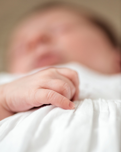 Hand detail of a sleeping newborn baby girl - Fotografie, Obrázek
