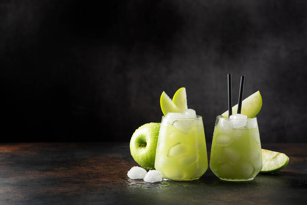 Summer cocktail with green apple and ice. Selective focus image with copy space - 写真・画像