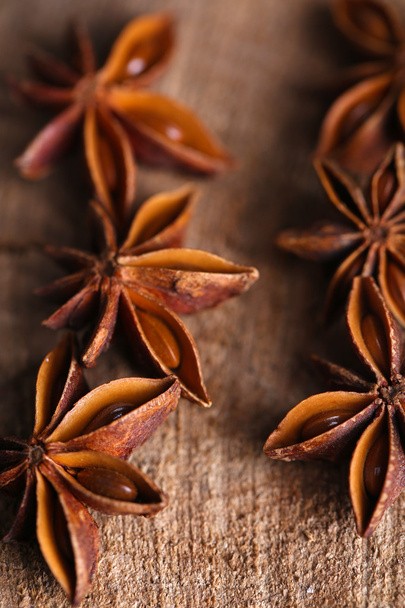 Star anise on wooden background - Photo, image