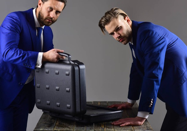 Businessman transfer deal, business black briefcase exchange - Fotoğraf, Görsel
