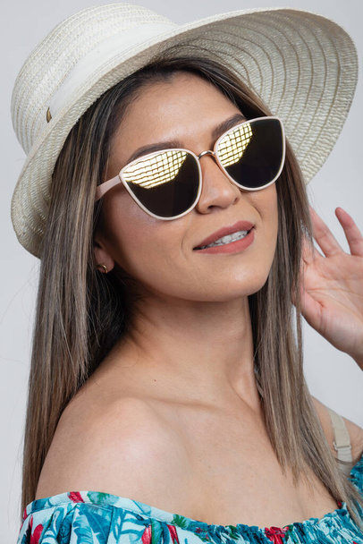 sunglasses latino model summer time with a hat  - Photo, Image