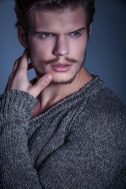 Face of a dramatic beauty male model looking away - Fotoğraf, Görsel