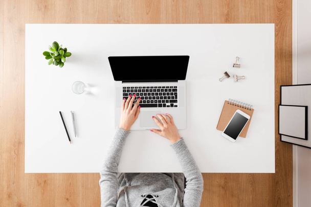 Woman hands working on laptop. Business background. Top view - Φωτογραφία, εικόνα