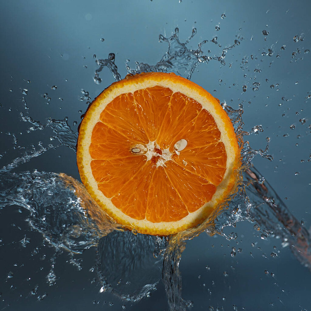 fresh orange in water splashes - Fotografie, Obrázek