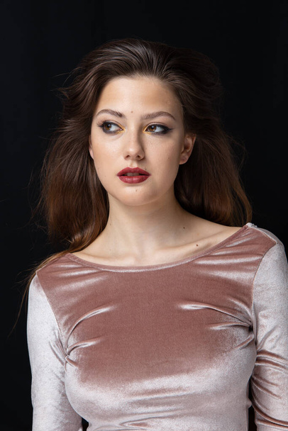 Beauty portrait of a girl with makeup with red lips - Zdjęcie, obraz