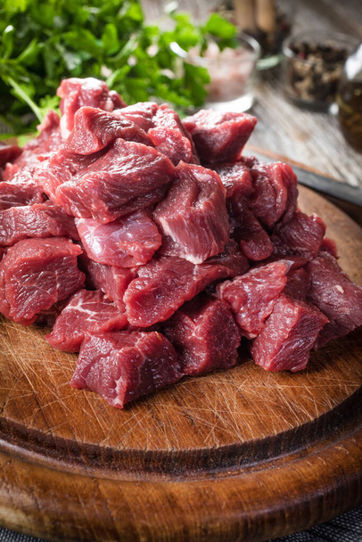 Beef stew prepared on a chopping board. Selective focus. - Zdjęcie, obraz