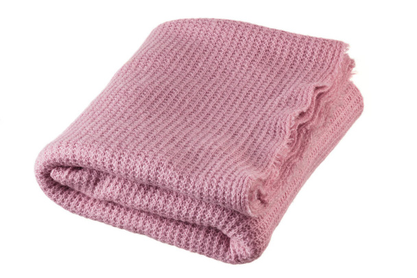 Closeup shot of knitted pink blanket isolated on white background. - Photo, Image