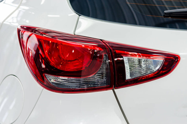 Car details - White luxury car tail lights.Modern LED light, white car rear. - Фото, зображення