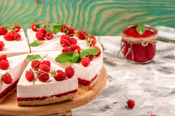 raspberry cream mousse cake no baked cheesecake Decorated with Fresh Berries and Mint. card, banner menu recipe place for text. - Photo, Image