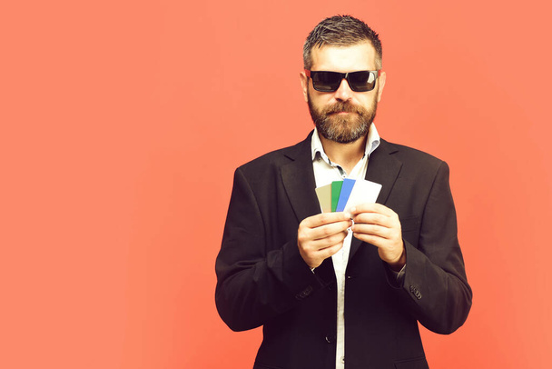 Business and luck concept. Businessman with empty cards, copy space - Fotografie, Obrázek