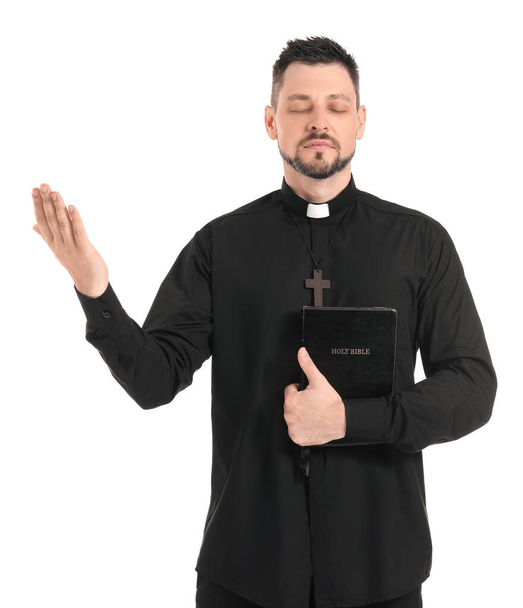 Handsome priest on white background - Photo, Image