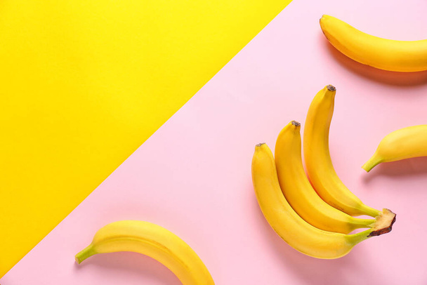 Ripe bananas on color background - Photo, image