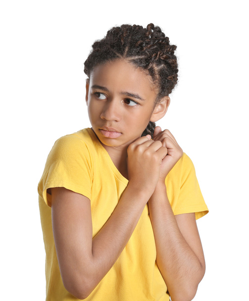 Sad African-American girl on white background. Stop racism - Photo, Image