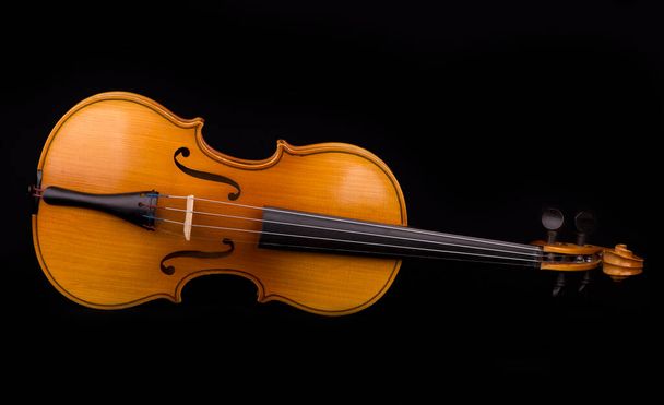 Violin music instrument of orchestra closeup isolated on black - Фото, изображение