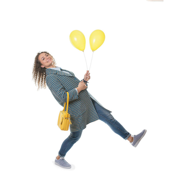 Beautiful young woman holding air balloons - Foto, afbeelding