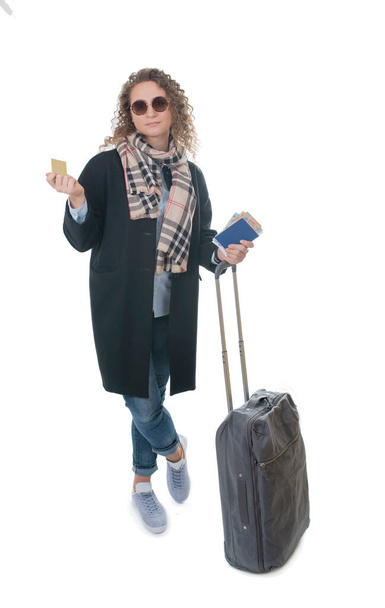 tourism, vacation, young girl with travel bag, on a white background. - Fotó, kép