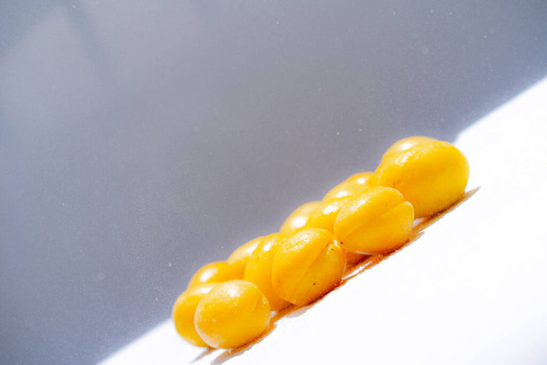 Ripe apricots on a white background - Photo, image