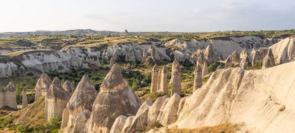 Beautiful morning at Love valley, Goreme town in Cappadocia, central Anatolia of Turkey, Asia. Panoramic banner portion - Φωτογραφία, εικόνα