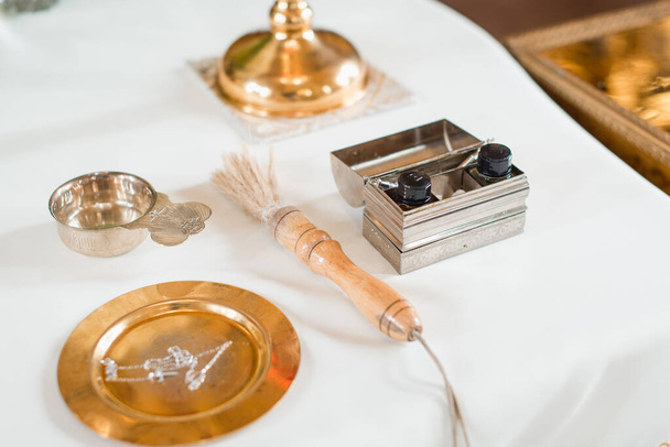 Set of priest for conducting the baptism ceremony in the Church - Photo, Image