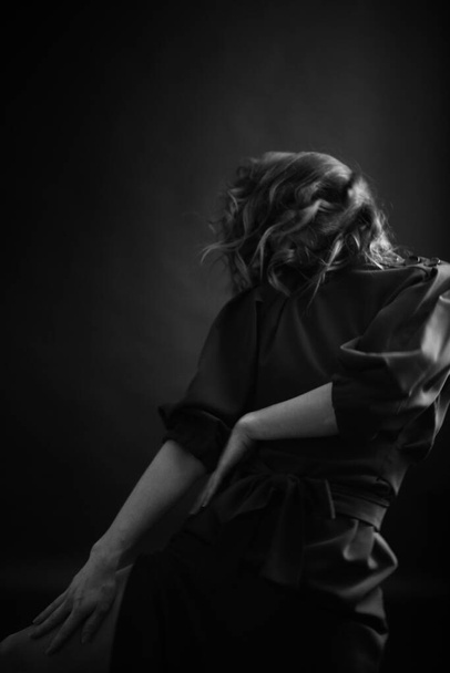 Details of body of beautiful girl, fashion and art, authentic black and white photo shoot, candid portrait of girl, movement and dance - Zdjęcie, obraz