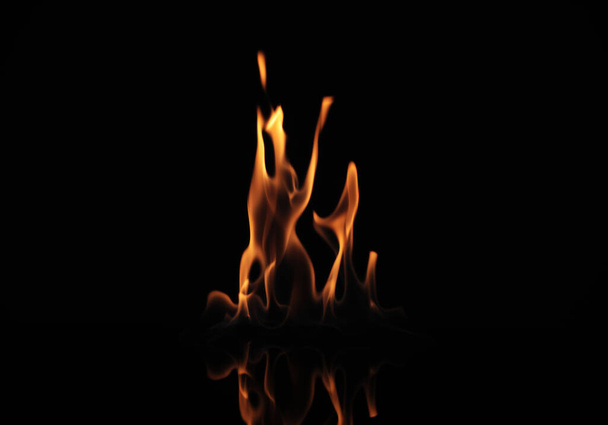 Beautiful bright fire flames on black background - Foto, Imagem