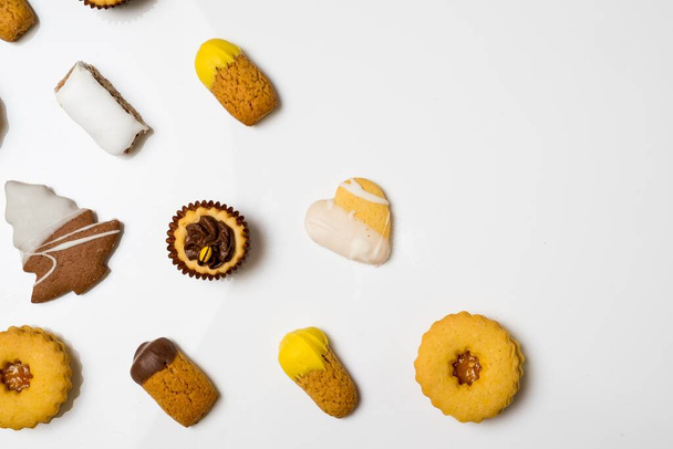 A different kinds of cookies isolated on a white background - Valokuva, kuva