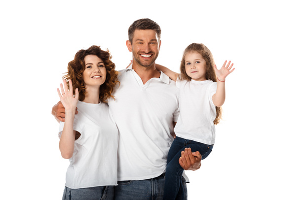happy mother and daughter waving hands near cheerful father isolated on white  - Фото, зображення