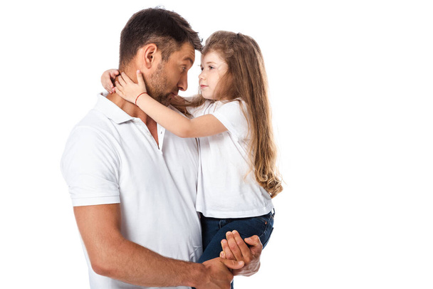 carino bambino abbracciare bello padre isolato su bianco  - Foto, immagini
