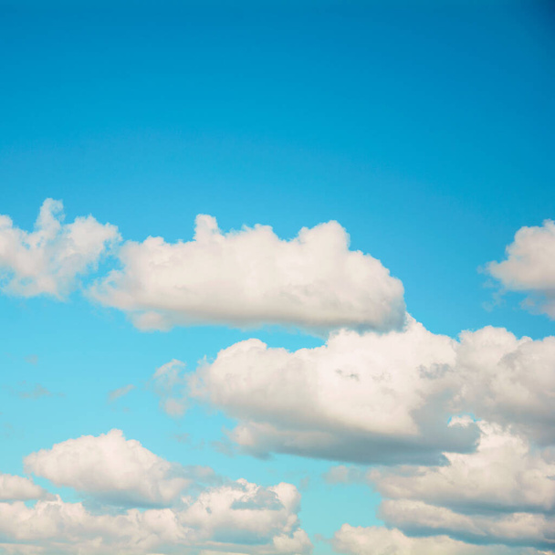 Large Clouds on a beautiful blue sky in summer - Photo, Image