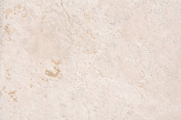 Beige limestone similar to marble natural surface for bathroom or kitchen countertop. High resolution texture and pattern. - Foto, Bild