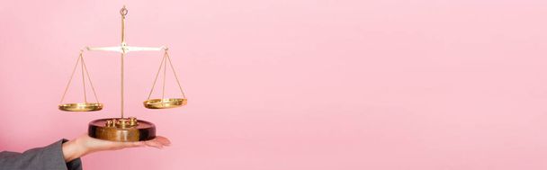 website header of businesswoman holding golden scales isolated on pink, gender equality concept  - Fotografie, Obrázek