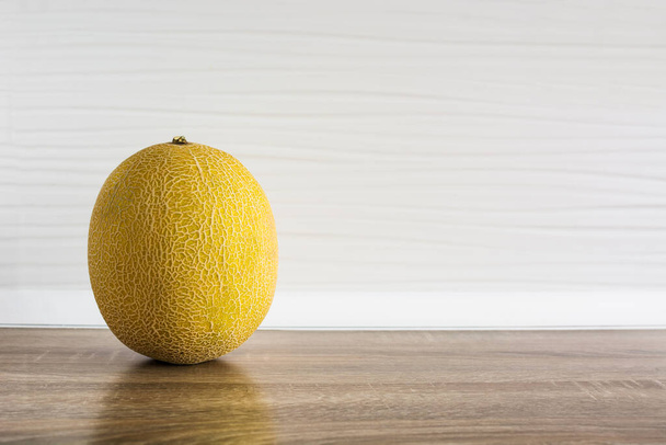 Cantaloupe yellow melon fruit in the kitchen - Φωτογραφία, εικόνα