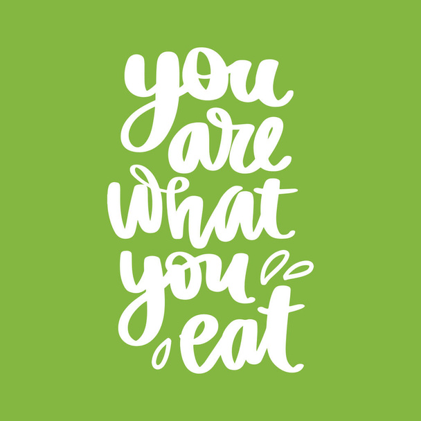 You are what you eat. Vector hand drawn lettering quote about healthy food. - Vector, afbeelding