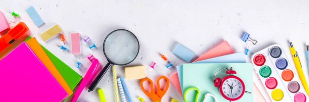 Back to school, education background. Back to School White Background with School Bag Backpack, Notebook, Pen, Pencil, Pencils, Magnifying Glass, Eraser, Paper Clip, Alarm Clock, School Supplies  - Φωτογραφία, εικόνα